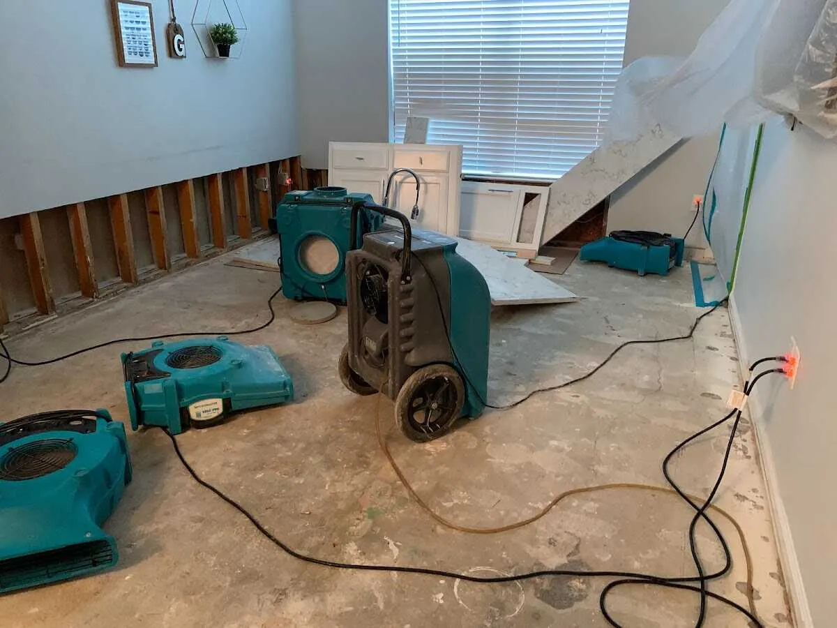 Dehumidifier in flood-cut room for Water Damage Restoration in West Clarkston-Highland